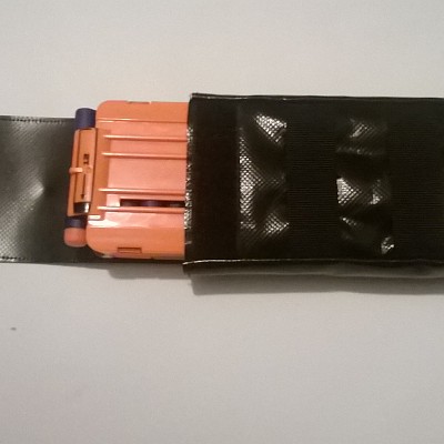 Magazintasche 12er mit Mollesystem an der Vorderseite.