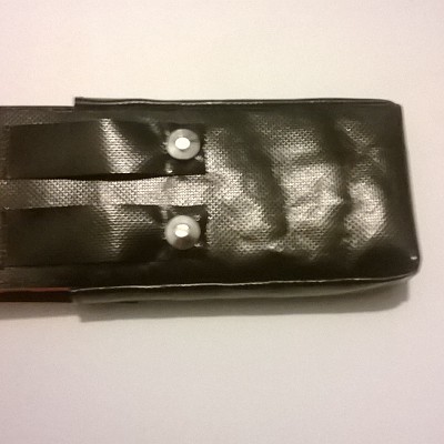 Magazintasche 12er mit Mollesystem an der Vorderseite.