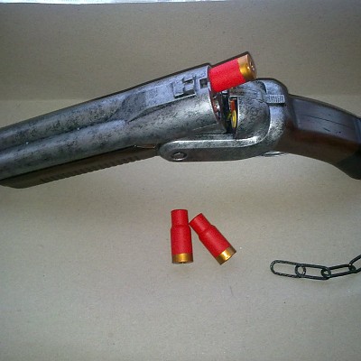 Boomstick von oben links mit einer Hülse