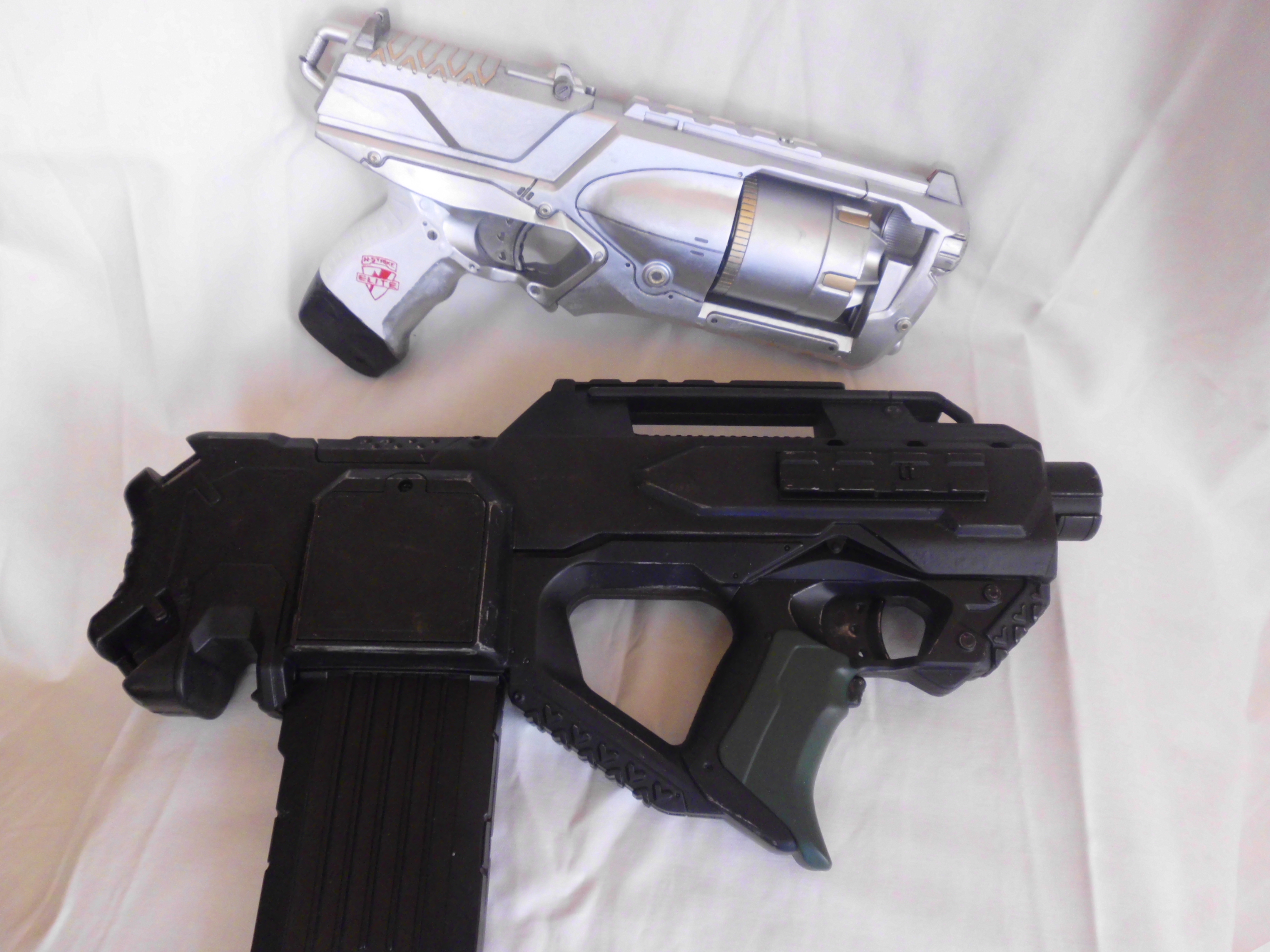 Nerf Strongarm:
N&J Arm Model Decapitator

Nerf Rayven:
N&J Arms Model TAR (Tactical Assault Rifle) mit Tim Taylor Mod