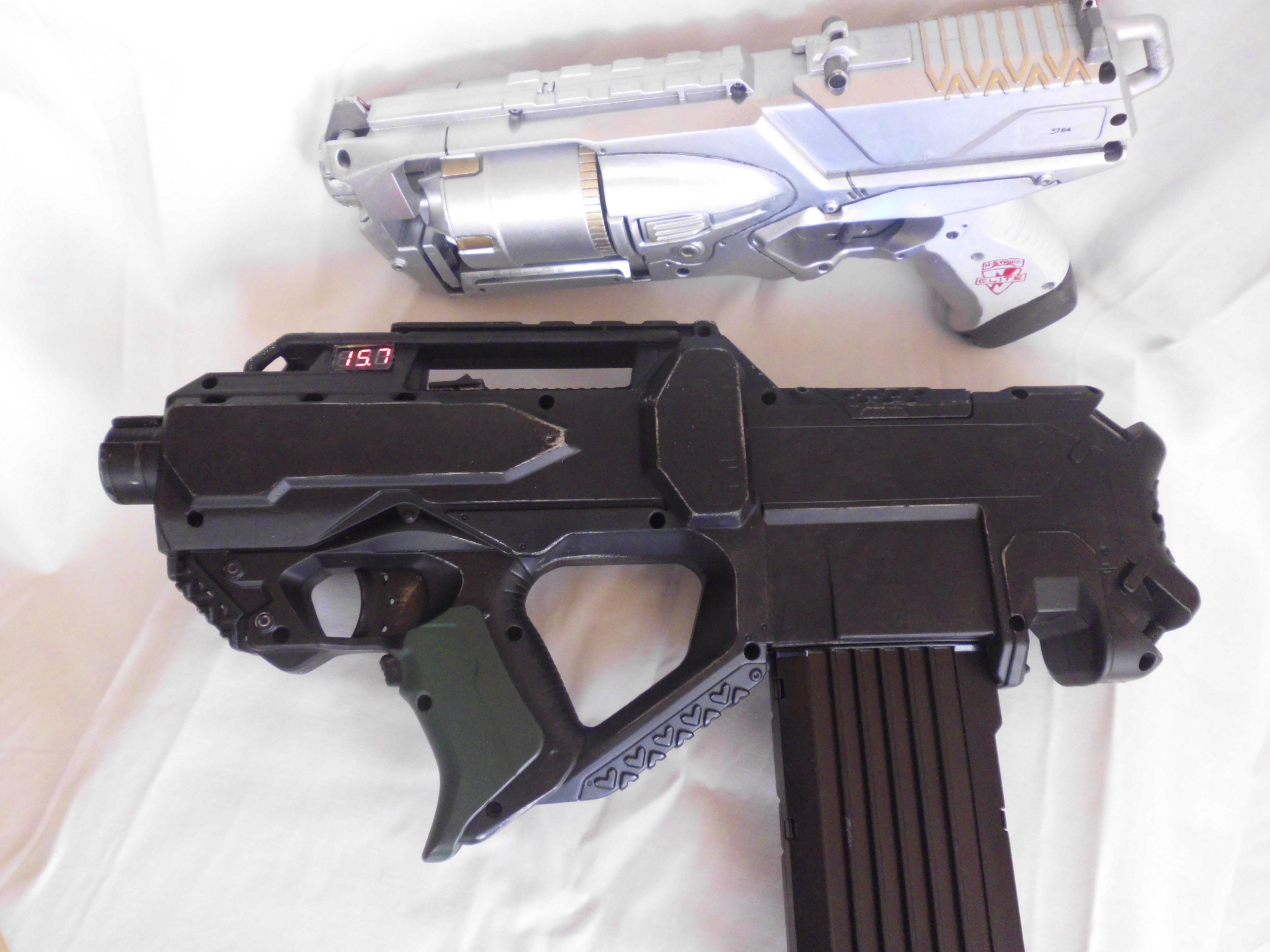 Nerf Strongarm:
N&J Arm Model Decapitator

Nerf Rayven:
N&J Arms Model TAR (Tactical Assault Rifle) mit Tim Taylor Mod